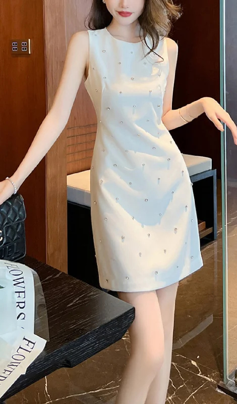 ROUND NECK STUDDED SLEEVELESS MINI DRESS IN WHITE Elegant mini dresses